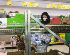 lady shopping wearing a mask