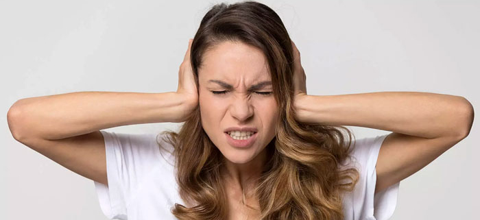 woman with tinnitus