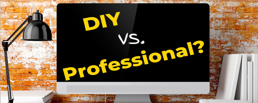 A computer screen displays the text "DIY vs. Professional?" in yellow and white against a black background, with a lamp and books nearby—highlighting the choice between DIY solutions and Professional Captioning Services.