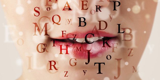 Close-up of a person's mouth with various letters in different fonts and sizes superimposed over the image, evoking themes of speech or language, as if seen through the lens of a forensic lip reader.