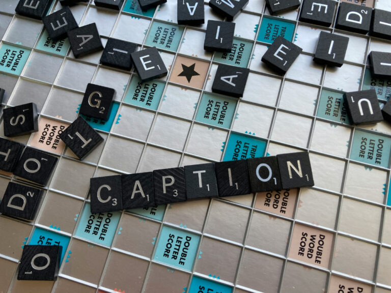 scrabble pieces spell out caption